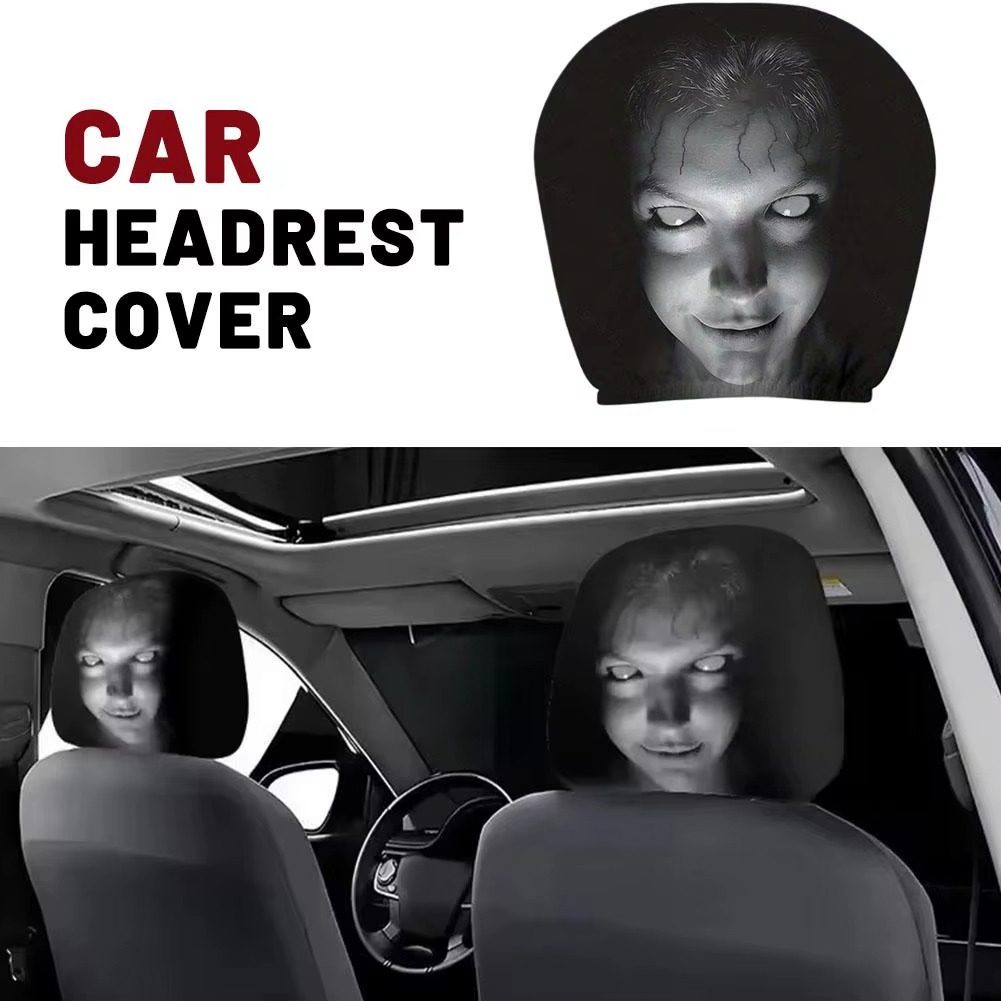 Horror headrest cover with glowing-eyed face installed on a car seat